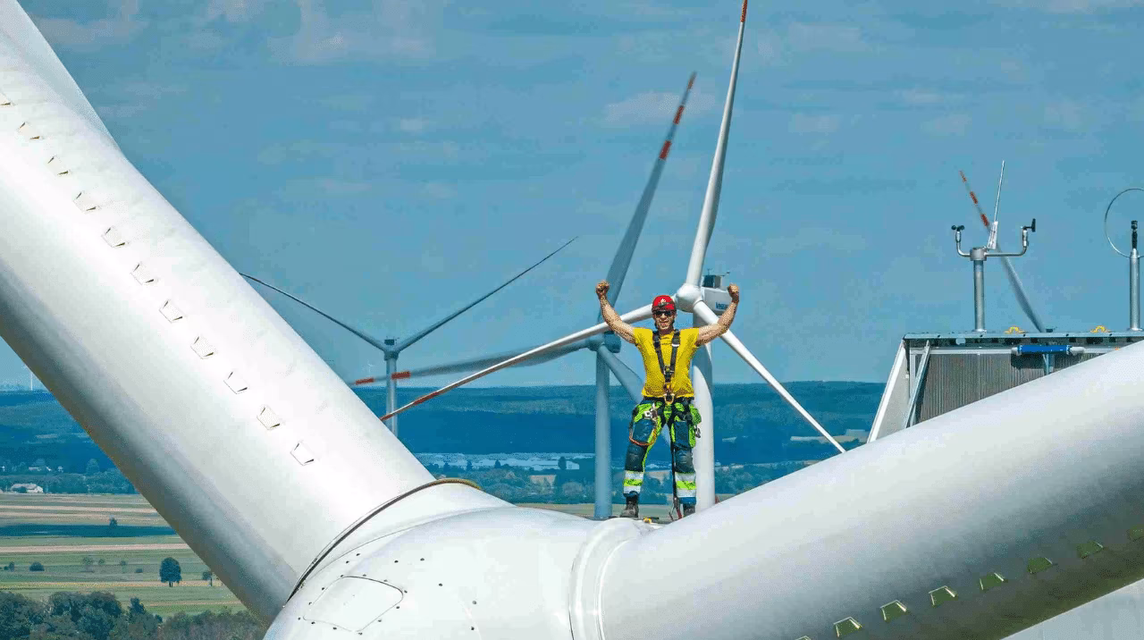 Wind turbine technician at the top of the turbine